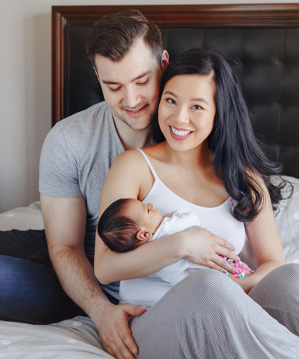 image of couple with newborn