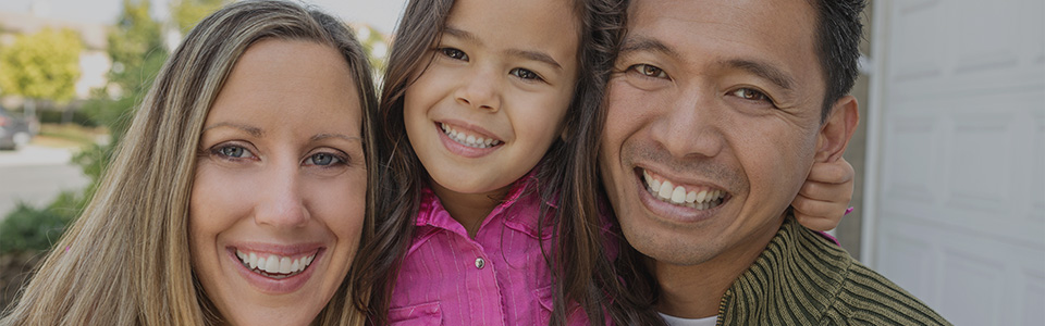 image of family with adopted child