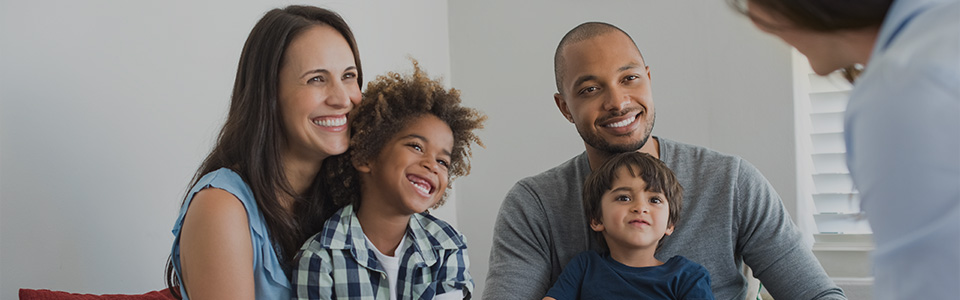 image of family with adopted child